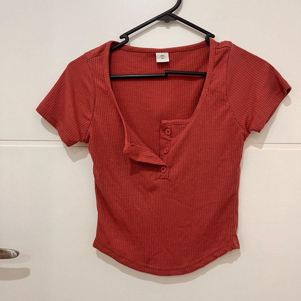 Pink buttoned tee